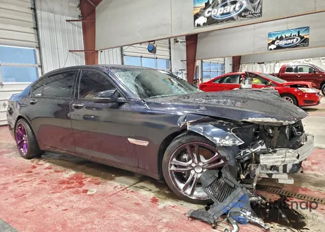 2015 BMW 740 Li z USA, uszkodzony, nr VIN WBAYE4C56FD138966